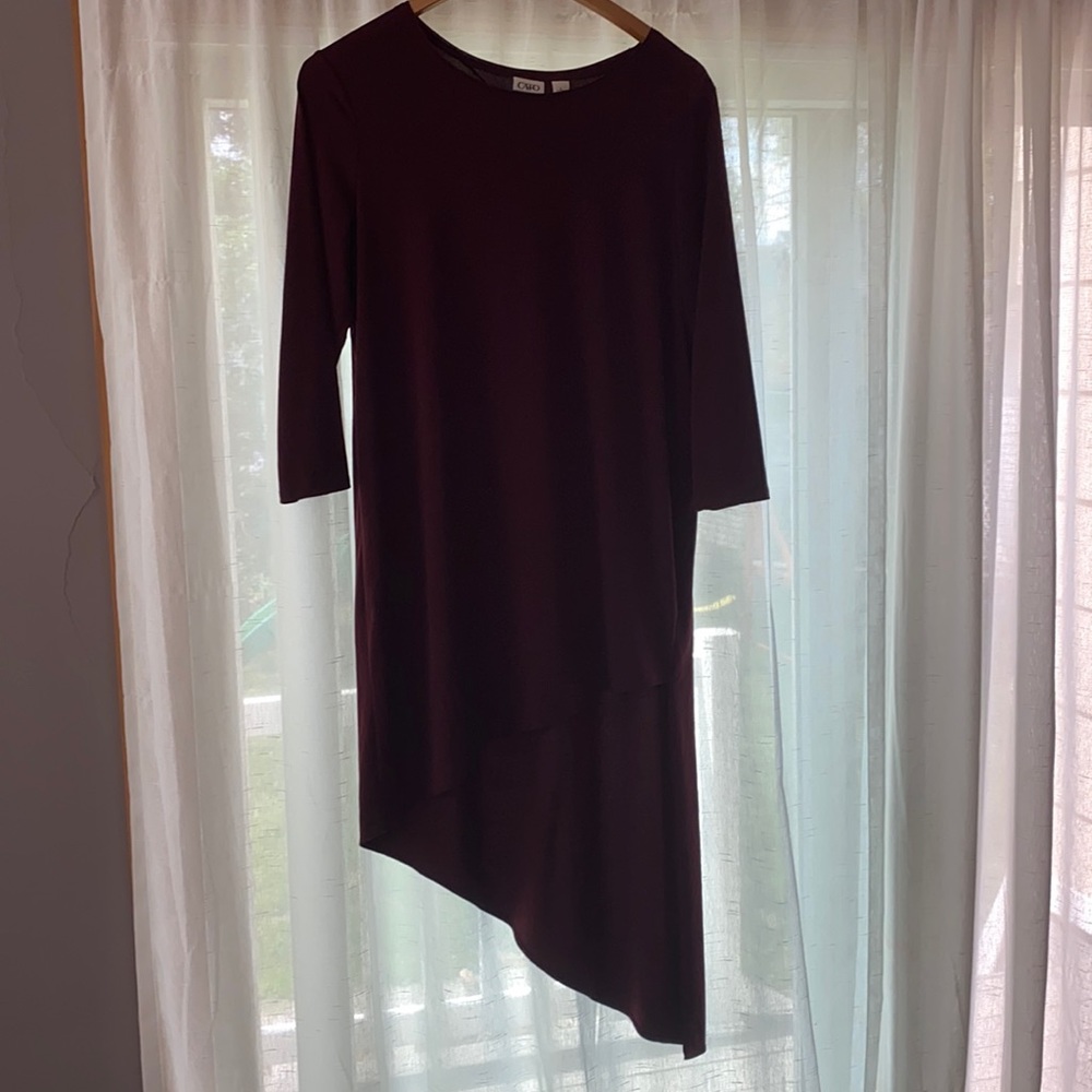 Cato maroon long sleeved asymmetrical dress.